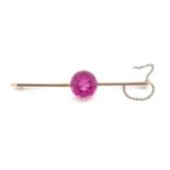 Pink glass and 9ct rose gold bar brooch