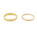 Two yellow gold wedding bands