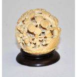 Antqique carved ivory village scene ball