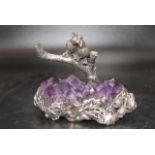 Silver birds figure on amethyst crystal base