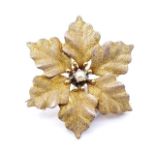 Antique yellow gold flower pendant brooch