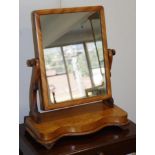 Antique serpentine front toilet mirror