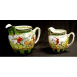 Graduated pair Royal Doulton Hunting Scene jugs