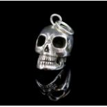 Silver skull charm