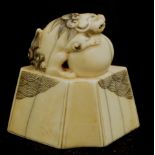 Japanese carved ivory temple dog netsuke