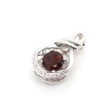 Garnet and diamond set 18ct white gold pendant