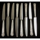 Eight Georgian sterling silver entree knives