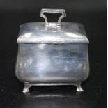 Sterling silver lidded tea caddy on four feet