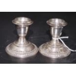 Pair of sterling silver candlesticks