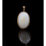 White opal and 9ct yellow gold pendant