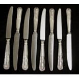 Eight Georgian sterling silver main knives