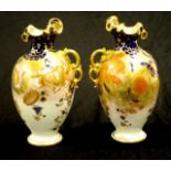 Pair Royal Crown Derby ewers