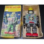Battery operated ' Fighting Space Man' toy