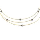 Three strand diamond set 18ct yellow gold necklace