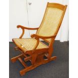 Antique teak rocking chair