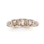 Antique three stone diamond and white gold ring