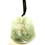 Chinese green jade tablet decorated with a GuanYin