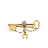 Antique opal set 9ct yellow gold key brooch