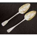 Two Georgian sterling silver berry serving spoons