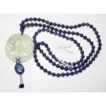 Lapis lazuli beaded necklace with jade pendant