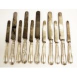 Set eleven Continental silver handled knives