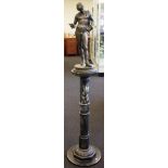 Antique bronze Roman figure on a marble pedestal