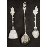 Three Dutch silver decorative serving spoons