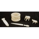 Four early carved ivory Elephant items