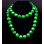 Oriental green hardstone monks beads