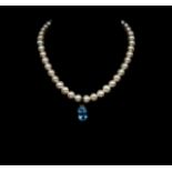 Topaz set silver pendant and pearl necklace