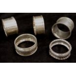 Four sterling silver napkin rings