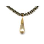 Textured silver gilt enhancer and beaded necklace