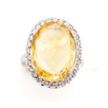 Citrine and diamond set 18ct white gold halo ring