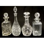 Four good cut crystal spirit decanters