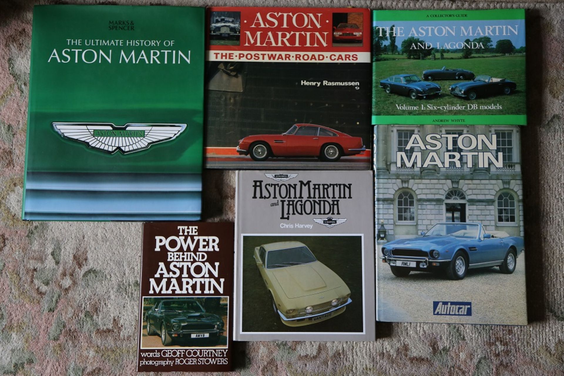 6 signed Aston Martin titles from the library of a motoring enthusiast.