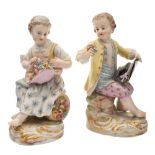 A pair of Meissen figures of gardeners' children after Kandler: the girl with flowers in her bonnet