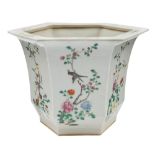 A Chinese famille rose hexagonal jardiniere: painted on each side with birds and flowering shrubs,