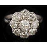 A diamond nine-stone 'flower head',