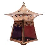 An Arts and Crafts copper hall lantern: of pagoda outline,