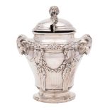 A French silver mustard pot: with domed hinged lid enclosing a clear glass liner,