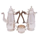 A George V matched silver three-piece coffee service: maker Mappin & Webb, London,