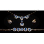A suite of 'Ceylon' blue and white sapphire mounted jewellery: with necklace,