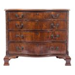 A mahogany serpentine-fronted chest in the Chippendale taste:, the moulded top with cut corners,