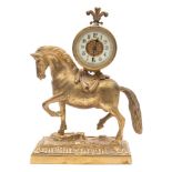 A French gilded brass mantel clock depicting a horse: the eight-day duration timepiece movement