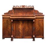 A Victorian carved mahogany breakfront chiffonier:,