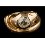 A diamond mounted 'snake' ring: the cushion-shaped old brilliant-cut diamond approximately 6.