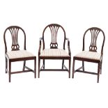 A set of eight mahogany dining chairs in the Hepplewhite taste:,