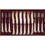 A set of pistol grip knives and forks with unmarked handles: having steel blades and tines,