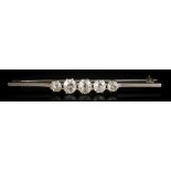 A graduated diamond five-stone bar brooch: with round old,