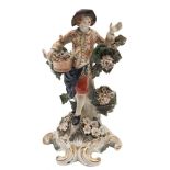 A Plymouth polychrome figure emblematic of Spring: the man wearing a floral jacket,